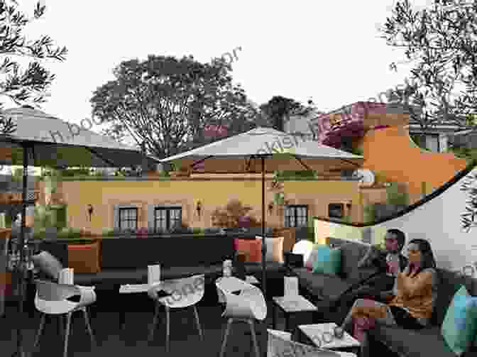 A Rooftop Garden In San Miguel De Allende, Offering Panoramic Views Of The City And Lush Greenery San Miguel De Allende Secrets: Christmas With St Nick S Nudes Devils And Jesus Doppelganger