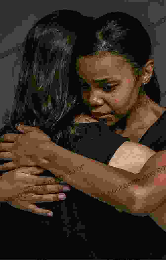 A Woman Embracing Another Person, Representing The Profound Act Of Forgiveness Because Of You Nia Arthurs