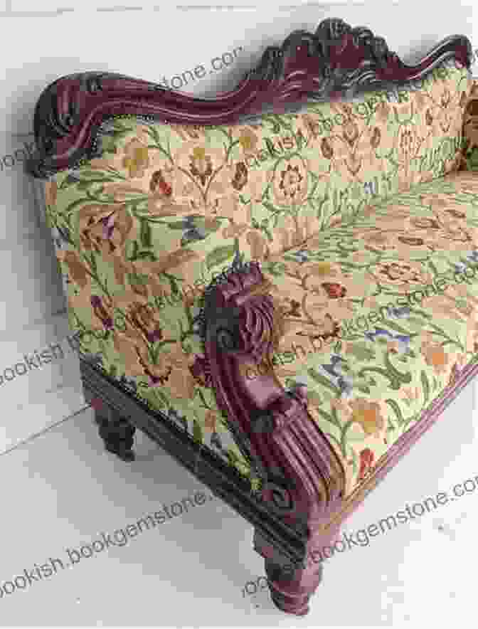 An Antique Victorian Sofa Adorned With Intricate Carvings And Plush Upholstery Home: A Novel (Vintage International)