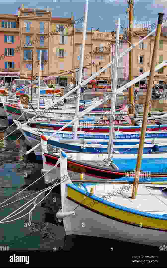 Charming Street Scene In Saint Tropez With Colorful Buildings And Sailboats In The Harbor Encore Provence: New Adventures In The South Of France (Vintage Departures)