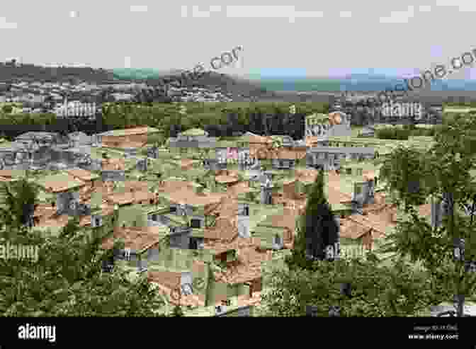 Panoramic View Of A Hilltop Town In The South Of France With Terracotta Roofed Houses, A Medieval Castle, And Lush Green Surroundings Encore Provence: New Adventures In The South Of France (Vintage Departures)